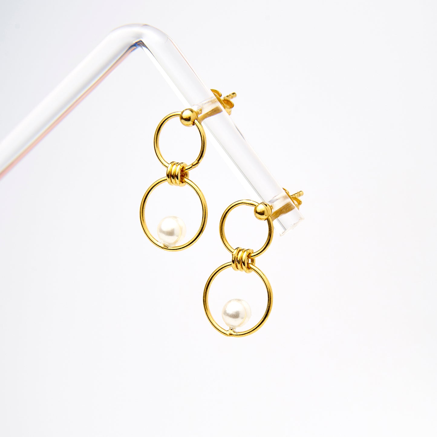 Brincos Circulares Balançantes com Pérola