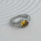 Anel Citra em aço inoxidável dourado e prateado com zircónia cítrica design orgânico coleção Fuse.