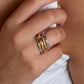 Anel Link bicolor em aço inoxidável com quatro aros interligados dourado prateado e zircónias coleção Fuse.