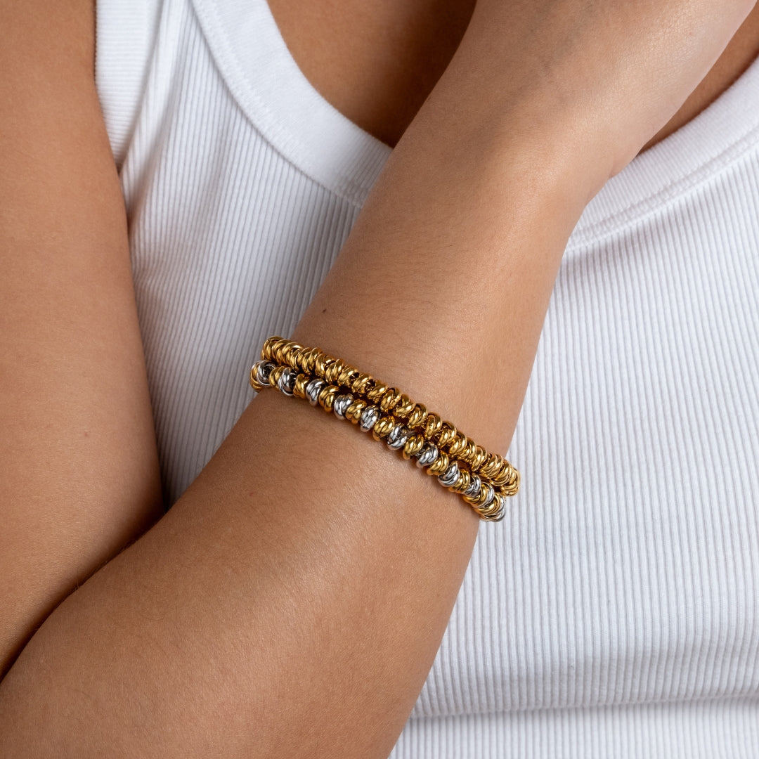 Pulseira Lumi bicolor e dourada em aço inoxidável elos amendoados coleção Fuse resistente à água.