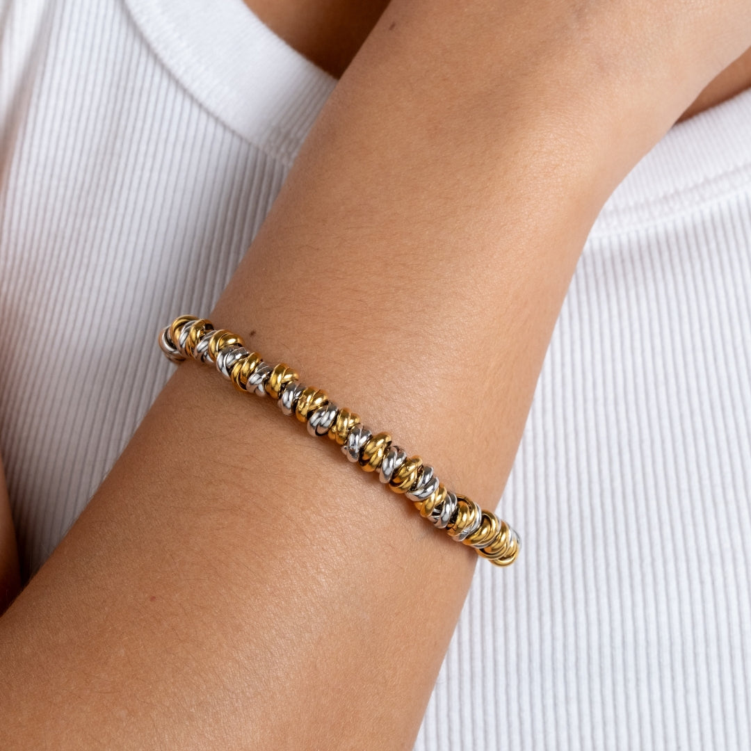 Pulseira Lumi bicolor e dourada em aço inoxidável elos amendoados coleção Fuse resistente à água.