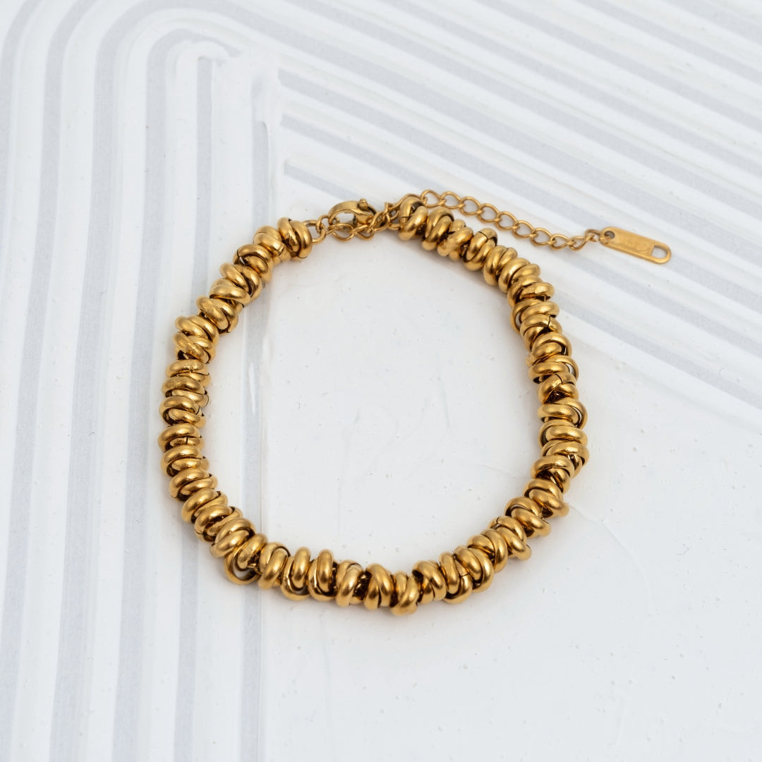 Pulseira Lumi bicolor e dourada em aço inoxidável elos amendoados coleção Fuse resistente à água.