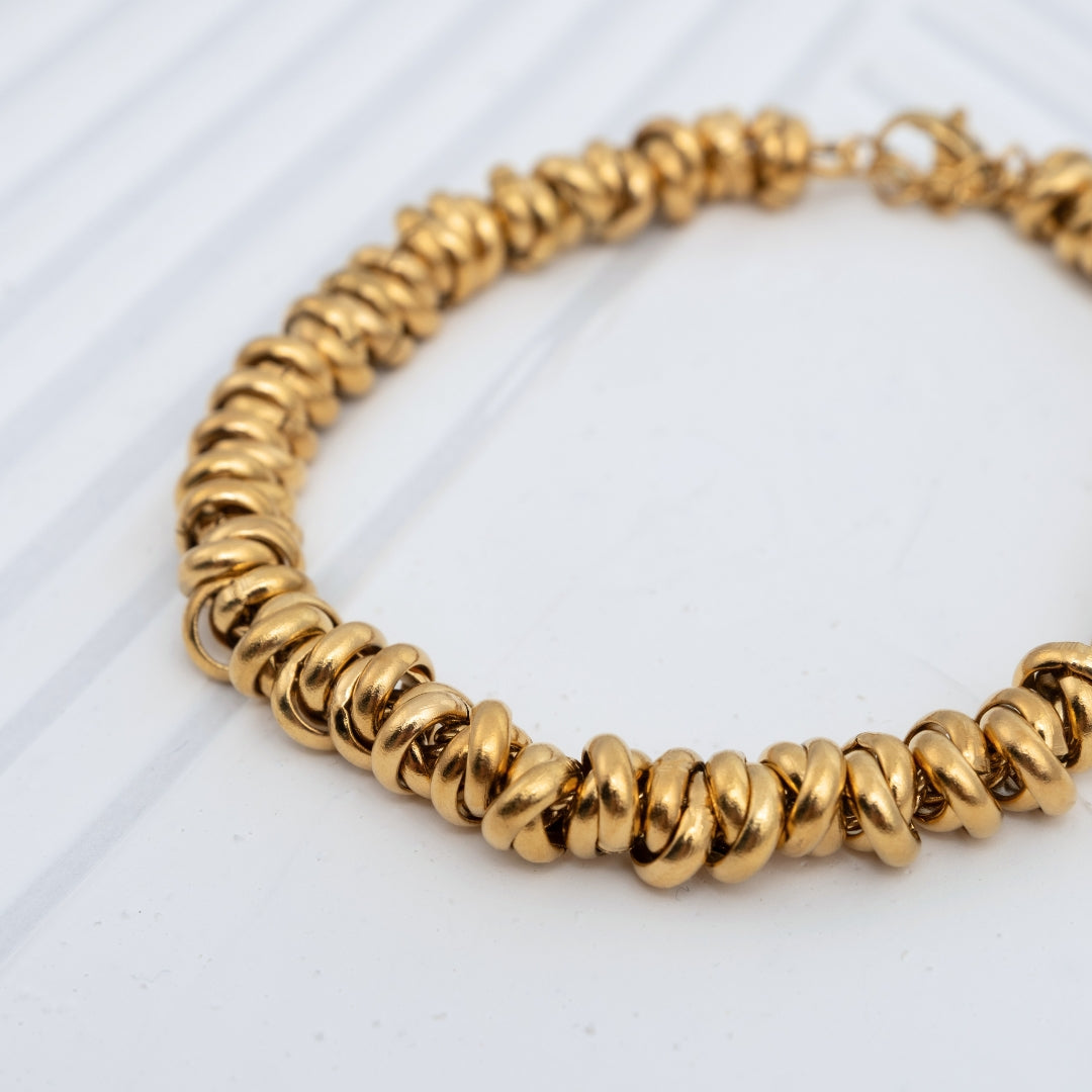 Pulseira Lumi bicolor e dourada em aço inoxidável elos amendoados coleção Fuse resistente à água.